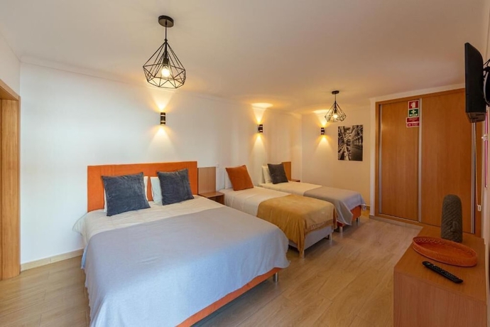 Imagen de la habitación del Hotel LUXURY PALM SUITES. Foto 14