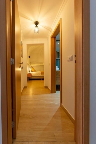 Imagen de la habitación del Hotel LUXURY PALM SUITES. Foto 16