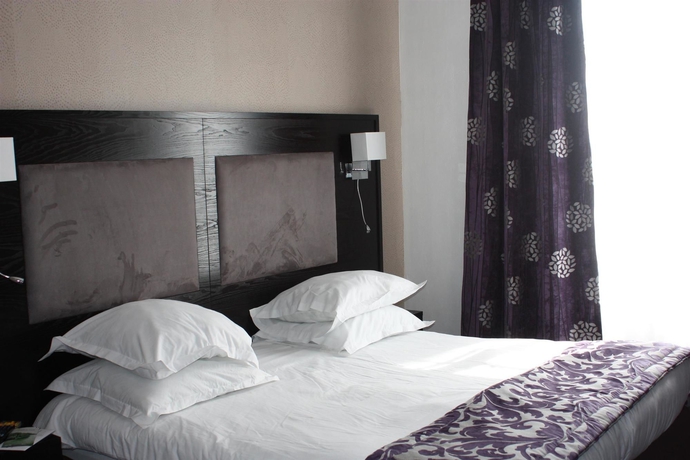 Imagen de la habitación del Hotel L'Univers. Foto 6