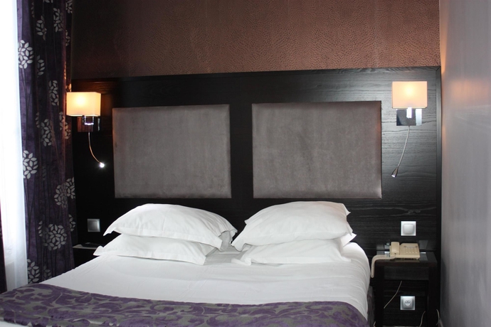 Imagen de la habitación del Hotel L'Univers. Foto 7