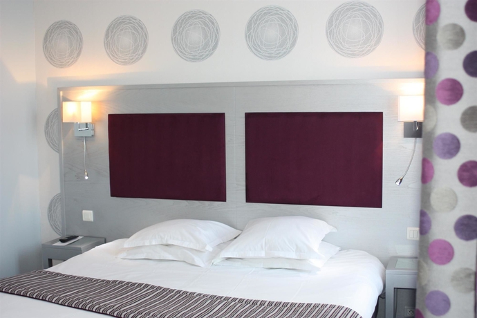 Imagen de la habitación del Hotel L'Univers. Foto 8