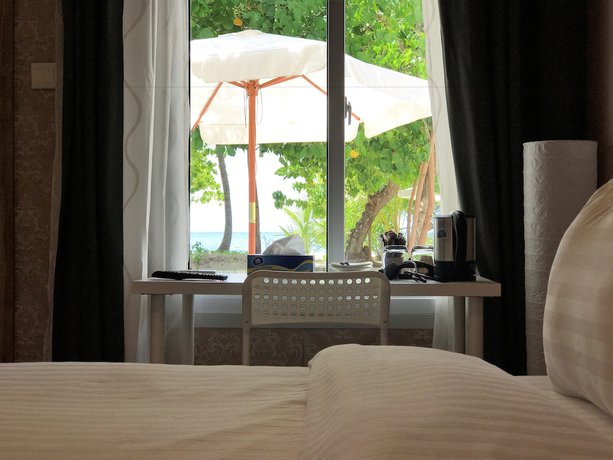 Imagen de la habitación del Hotel LVIS blancura. Foto 11