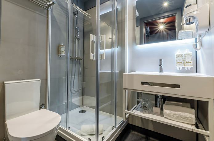 Imagen de la habitación del Hotel LX ARCH. Foto 4