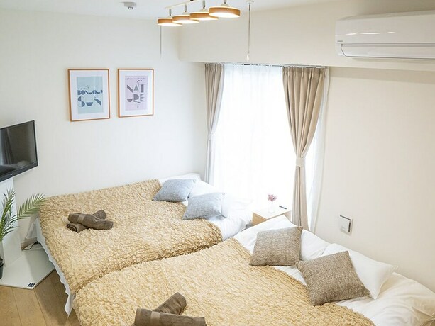 Imagen de la habitación del Hotel LY INN Tokyo Honjo. Foto 24