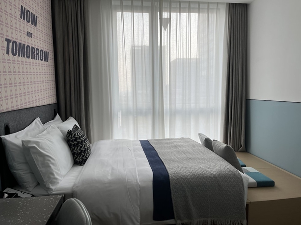 Imagen de la habitación del Hotel LYF Hongqiao Shanghai. Foto 2