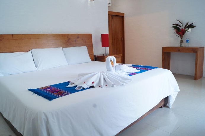 Imagen general del Hotel La Aldea Del Halach Huinic. Foto 7