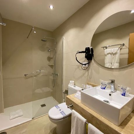 Imagen de la habitación del Hotel La Aldea Suites. Foto 3