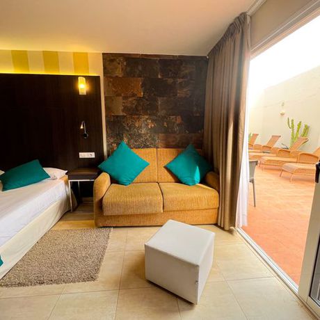 Imagen de la habitación del Hotel La Aldea Suites. Foto 4