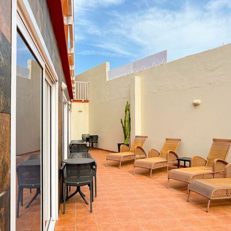 Imagen de los exteriores del Hotel La Aldea Suites. Foto 13