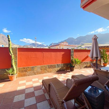 Imagen de los exteriores del Hotel La Aldea Suites. Foto 15