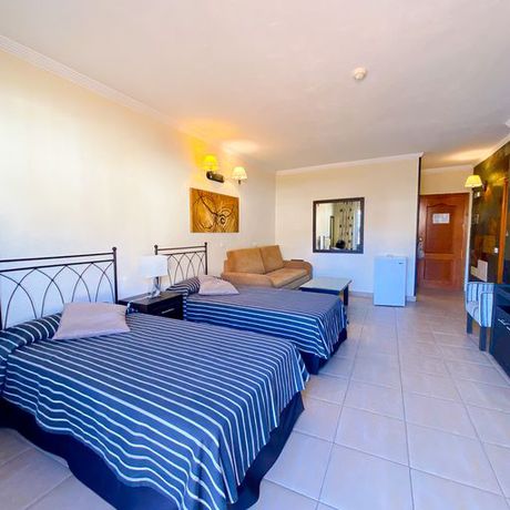 Imagen de la habitación del Hotel La Aldea Suites. Foto 8