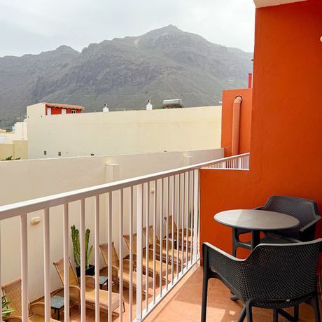 Imagen de los exteriores del Hotel La Aldea Suites. Foto 18