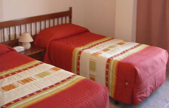 Imagen de la habitación del Hotel La Alegr&iacute;a. Foto 14