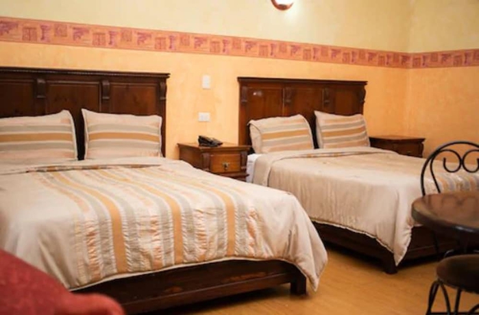 Imagen de la habitación del Hotel La Alhondiga. Foto 16