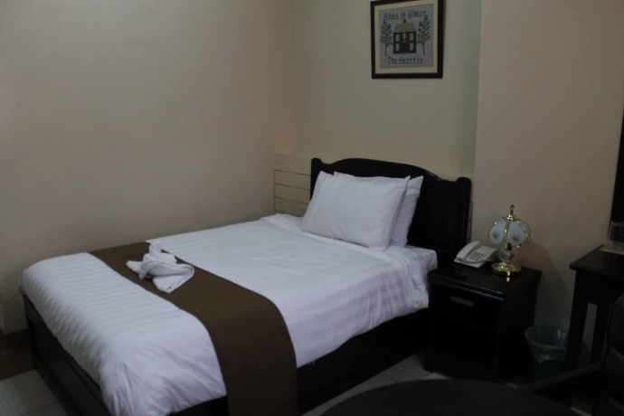 Imagen de la habitación del Hotel La Anclar Hometel. Foto 13