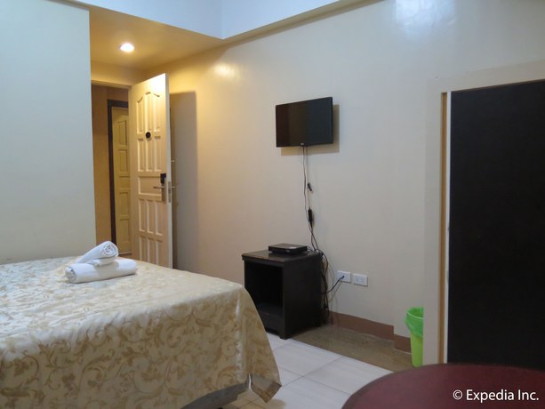Imagen de la habitación del Hotel La Anclar Hometel. Foto 14