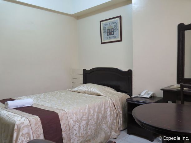 Imagen de la habitación del Hotel La Anclar Hometel. Foto 15