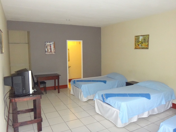 Imagen de la habitación del Hotel La Arboleda. Foto 7