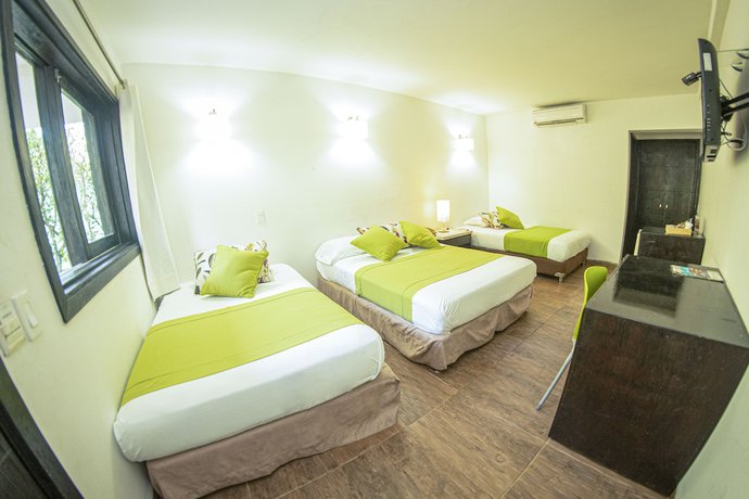 Imagen de la habitación del Hotel La Ardilla De Santa Fe. Foto 3