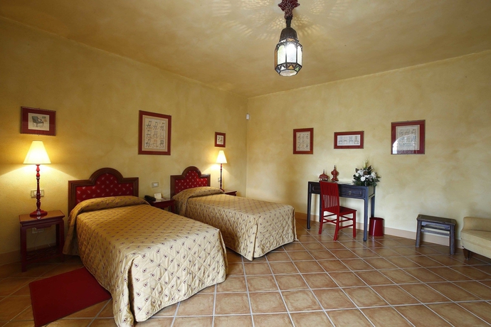 Imagen de la habitación del Hotel La Bagnaia Golf Resort. Foto 2