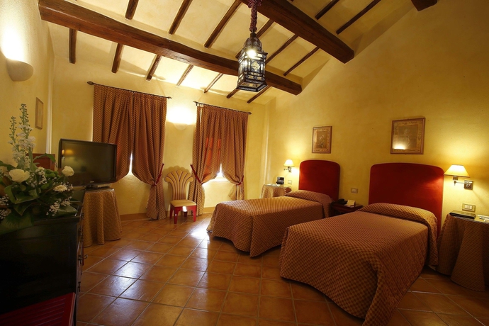 Imagen de la habitación del Hotel La Bagnaia Golf Resort. Foto 4