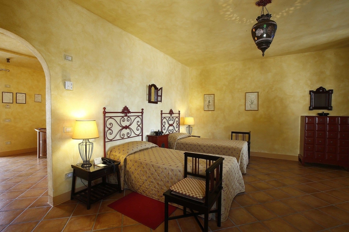 Imagen de la habitación del Hotel La Bagnaia Golf Resort. Foto 5