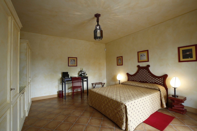 Imagen de la habitación del Hotel La Bagnaia Golf Resort. Foto 8