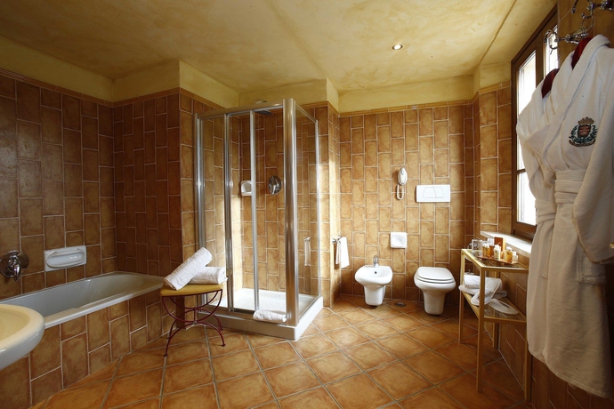 Imagen de la habitación del Hotel La Bagnaia Golf Resort. Foto 9