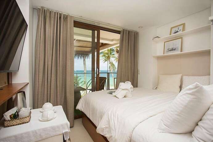 Imagen de la habitación del Hotel La Banca House Boracay. Foto 18