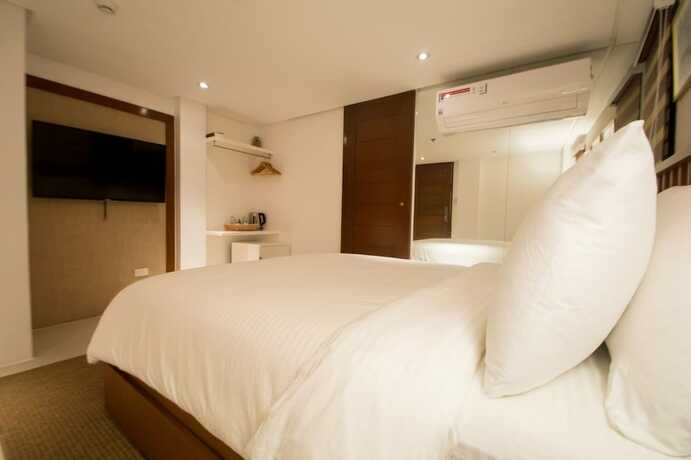 Imagen de la habitación del Hotel La Banca House Boracay. Foto 20
