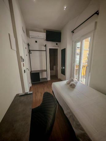 Imagen de la habitación del Hotel La Banda Suites. Foto 9