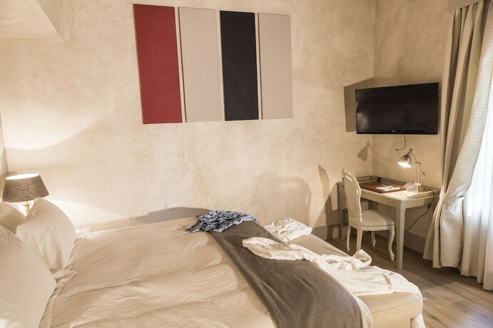Imagen de la habitación del Hotel La Barchessa di Villa Pisani. Foto 13
