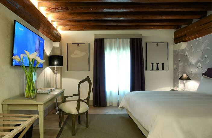Imagen de la habitación del Hotel La Barchessa di Villa Pisani. Foto 19