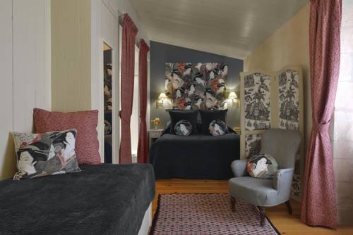 Imagen de la habitación del Hotel La Baronnie Hôtel & SPA. Foto 10