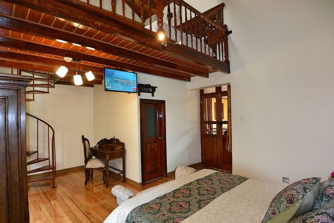 Imagen de la habitación del Hotel La Basílica Quito. Foto 3