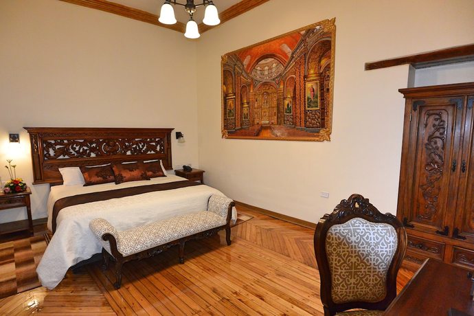 Imagen de la habitación del Hotel La Basílica Quito. Foto 6