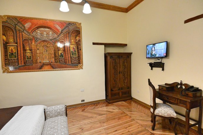 Imagen de la habitación del Hotel La Basílica Quito. Foto 13