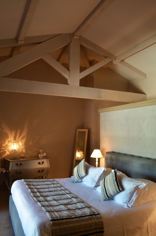 Imagen de la habitación del Hotel La Bastide Du Clos Des Roses. Foto 5