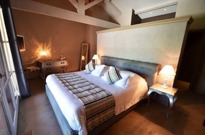 Imagen de la habitación del Hotel La Bastide Du Clos Des Roses. Foto 8
