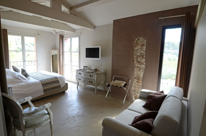 Imagen de la habitación del Hotel La Bastide Du Clos Des Roses. Foto 9