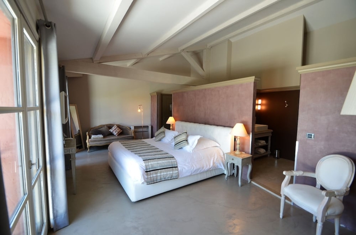 Imagen de la habitación del Hotel La Bastide Du Clos Des Roses. Foto 10