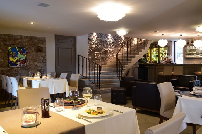 Imagen del bar/restaurante del Hotel La Bastide Du Clos Des Roses. Foto 4