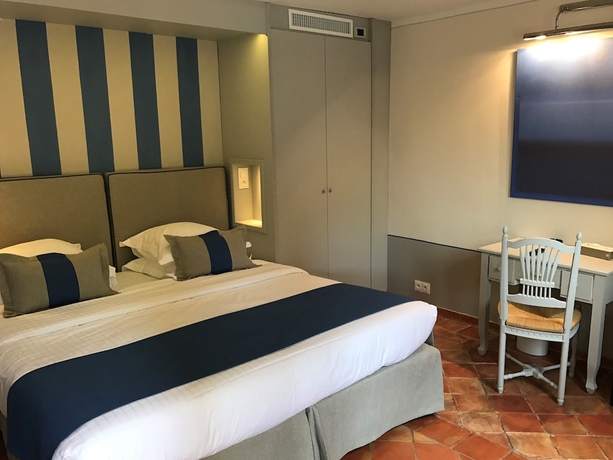 Imagen de la habitación del Hotel La Bastide Du Port. Foto 6