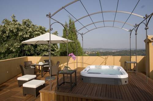 Imagen de la habitación del Hotel La Bastide Saint Antoine. Foto 13