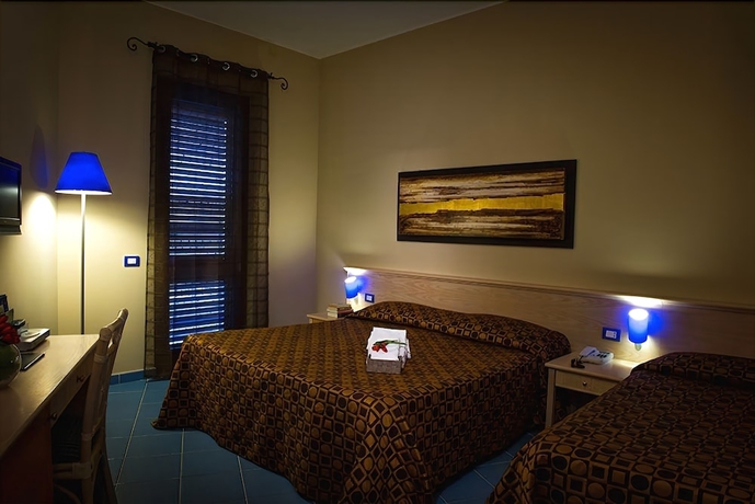 Imagen de la habitación del Hotel La Battigia. Foto 12