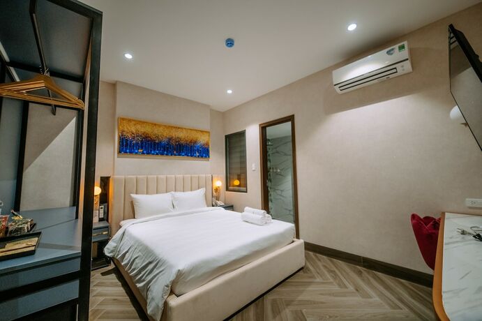 Imagen de la habitación del Hotel La Beaute. Foto 16