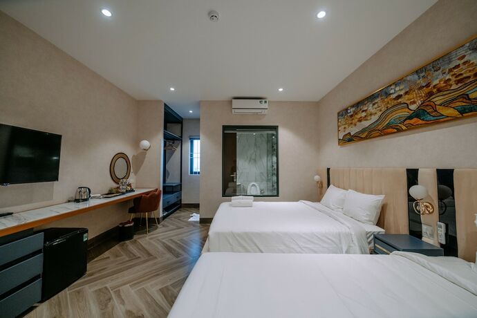 Imagen de la habitación del Hotel La Beaute. Foto 19