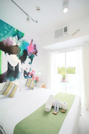 Imagen de la habitación del Hotel La Bella Boutique. Foto 17