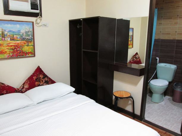 Imagen de la habitación del Hotel La Bella Casa De Boracay. Foto 5