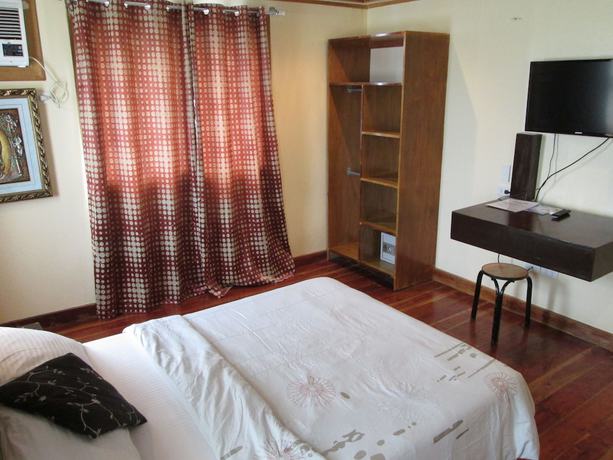 Imagen de la habitación del Hotel La Bella Casa De Boracay. Foto 7